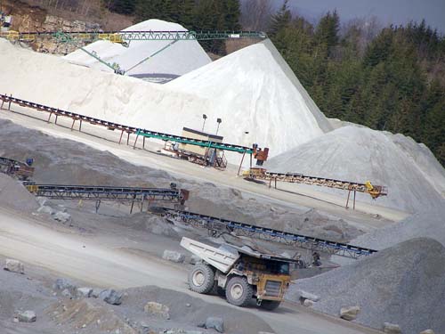 The Acton Quarry - big truck and aggregate piles.