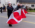 flags in Acton Santa Claus parade