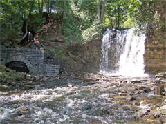 Hilton Falls Conservation Area waterfall, Ontario. Looking towards the falls and the waterwheel outlet