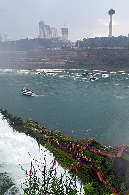 American Niagara Falls looking towards Canada with the Maid of the Mist boat in the river
