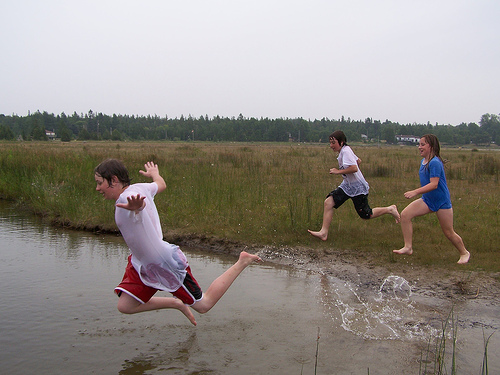 kids jumping into a creek in the Bruce Peninsula, Ontario