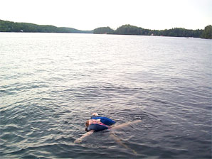 Erin floating in Kawagama Lake