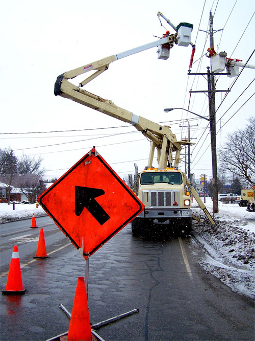 hydro electric crews replacing a pole