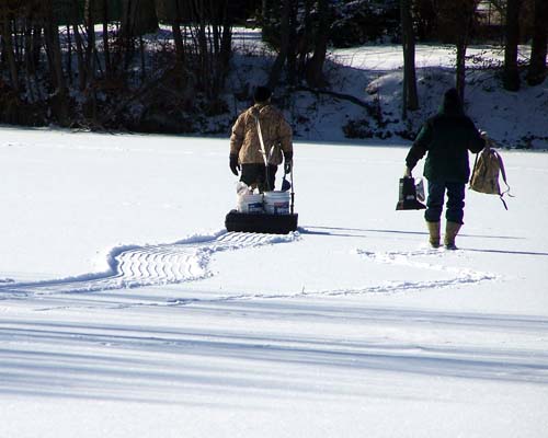 Ice fishermen take their gear onto the ice on Acton's Fairy Lake