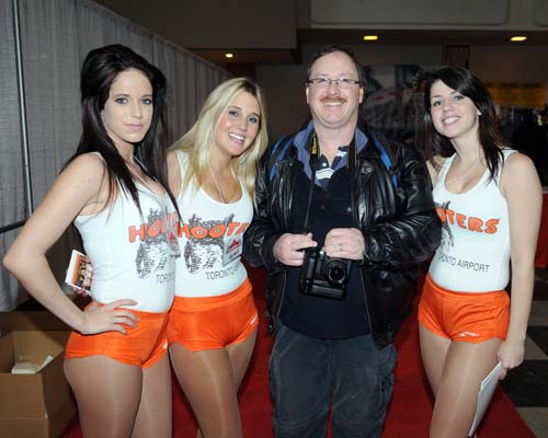 James with some Hooters girls